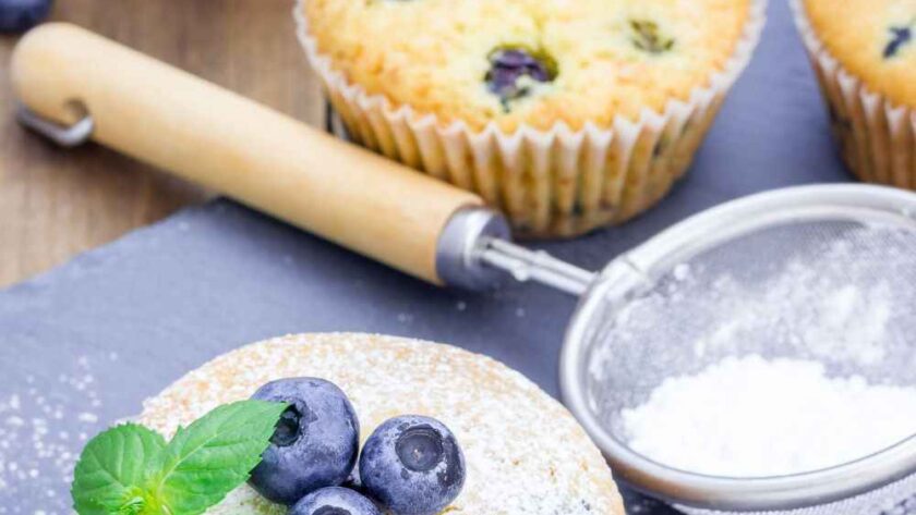 Ina Garten Coffee Cake Blueberry Muffins Recipe Ina Garten Coffee Cake Blueberry Muffins Recipe Ingredients 12 tablespoons (1 1/2 sticks) unsalted butter, at room temperature 1 1/2 cups sugar 3 extra-large eggs, at room temperature 1 1/2 teaspoons pure vanilla extract 8 ounces (about 1 cup) sour cream 1/4 cup milk 2 1/2 cups all-purpose flour 2 teaspoons baking powder 1/2 teaspoon baking soda 1/2 teaspoon kosher salt 2 half-pints fresh blueberries, picked through for stems How To Make Ina Garten Coffee Cake Blueberry Muffins Recipe Preheat oven and prep pans: Set your oven to 350°F. Line 16 muffin cups with paper liners. Cream butter and sugar: In a stand mixer or with hand beaters, cream the butter and sugar on medium-high speed for about 5 minutes, until light and fluffy. Add wet ingredients: Beat in eggs one at a time. Then mix in vanilla, sour cream, and milk. Mix dry ingredients: In a separate bowl, sift together flour, baking powder, baking soda, and salt. Gradually add the dry ingredients to the wet, mixing just until combined. Fold in blueberries: Gently stir in the blueberries with a spatula to avoid crushing them. Fill and bake: Scoop the batter into the prepared muffin cups, filling each just over the top. Bake and cool: Bake for 25–30 minutes until golden and a toothpick comes out clean. Let cool in the pan for 5 minutes, then transfer to a wire rack. Recipe Tips How to prevent blueberries from sinking: Toss them in a tablespoon of flour before folding into the batter. Can I use frozen blueberries? Yes, but do not thaw—fold them in directly from the freezer to prevent bleeding. What’s the best sour cream substitute? Greek yogurt works well and gives a similar moisture and tang. How to get domed muffin tops: Fill the cups generously and make sure your oven is fully preheated before baking. Can I add a crumb topping? Yes! Mix butter, flour, sugar, and cinnamon for a streusel to sprinkle on top before baking. What To Serve With Blueberry Muffins These muffins are perfect for breakfast or snacks, especially when paired with: Hot coffee or tea Fresh fruit salad Yogurt and granola Scrambled eggs or quiche Honey butter or cream cheese spread How To Store Blueberry Muffins Room Temperature: Store in an airtight container for up to 2 days. Refrigerate: Store for up to 5 days, but reheat slightly before serving to restore moisture. Freeze: Wrap muffins tightly and freeze for up to 2 months. Thaw at room temperature or microwave for 30 seconds. Blueberry Muffins Nutrition Facts Calories: 200 Protein: 3g Fat: 9g Carbohydrates: 28g Sugar: 15g Fiber: 1g Sodium: 120mg Nutrition information is estimated and may vary based on ingredients and cooking methods used. FAQs Can I use a different berry? Yes, raspberries or chopped strawberries work well—just make sure to pat them dry before using. Why are my muffins dry? They may be overbaked. Check doneness early and store them properly to retain moisture. How do I make jumbo muffins? Use a jumbo muffin tin and bake a few minutes longer, checking for doneness with a toothpick. Can I make these gluten-free? Yes, substitute with a 1:1 gluten-free flour blend. What’s the difference between these and cupcakes? These muffins are less sweet, have a denser crumb, and no frosting—perfect for breakfast.